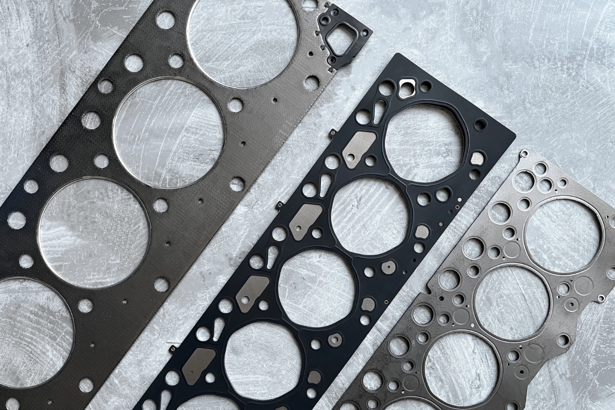 What are the symptoms of a blown head gasket?