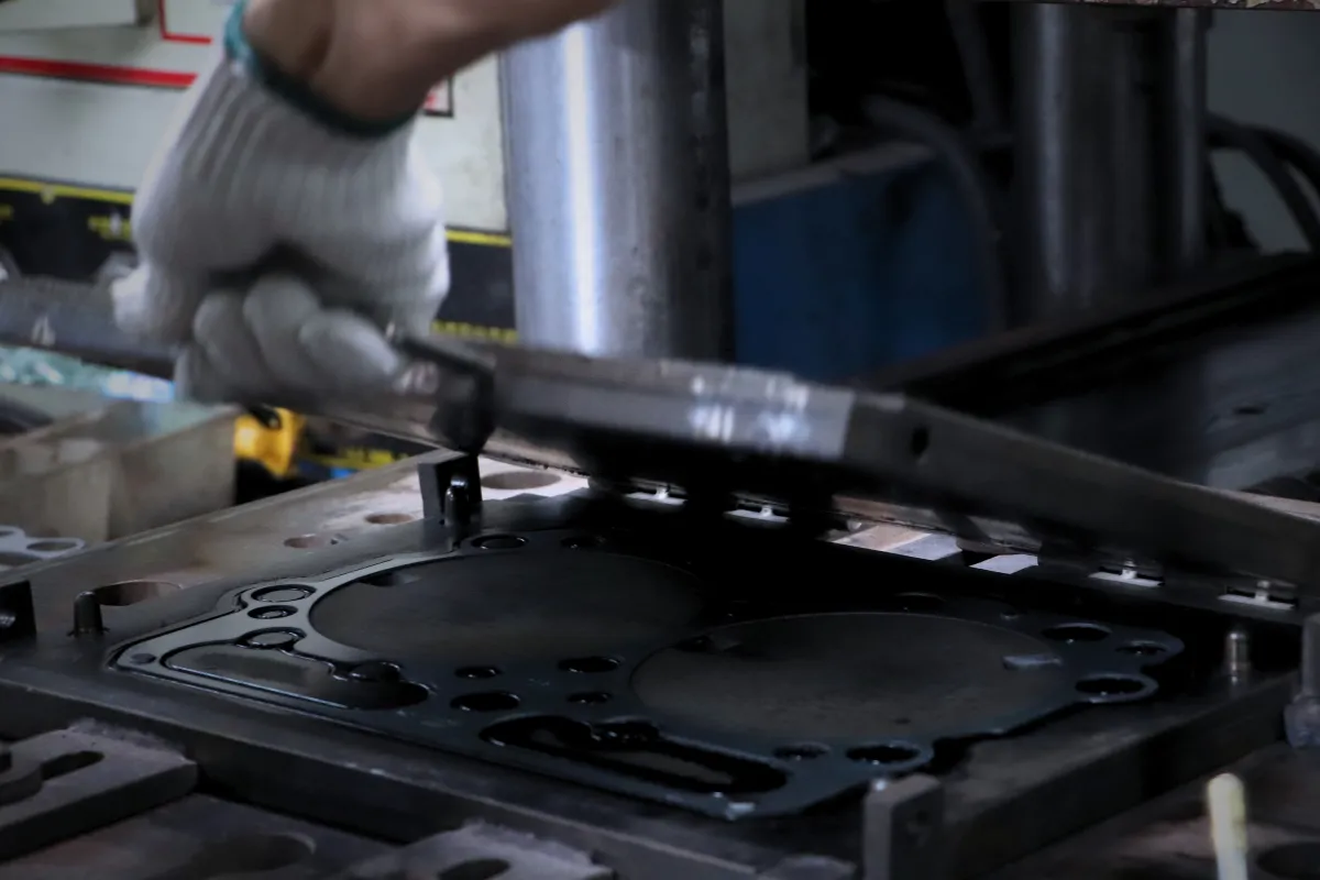 Operator checking a formed gasket